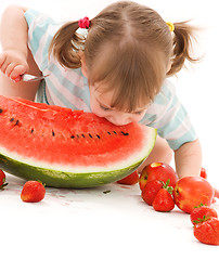 Image showing little girl with strawberry and watermelon