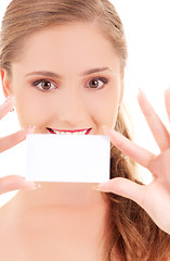 Image showing happy girl with business card