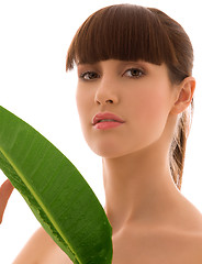 Image showing woman with green leaf