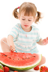 Image showing little girl with strawberry and watermelon