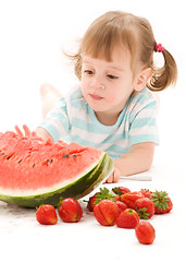 Image showing little girl with strawberry and watermelon