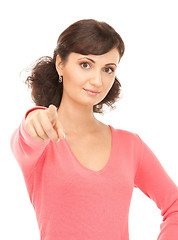 Image showing attractive businesswoman pointing her finger