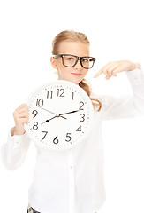 Image showing girl holding big clock