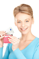 Image showing lovely woman with purse and money