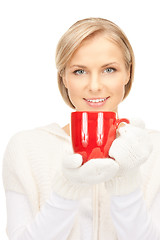 Image showing beautiful woman with red mug