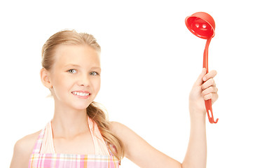 Image showing little housewife with red ladle