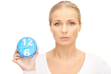 Image showing woman holding alarm clock