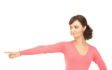 Image showing attractive businesswoman pointing her finger