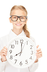 Image showing girl holding big clock