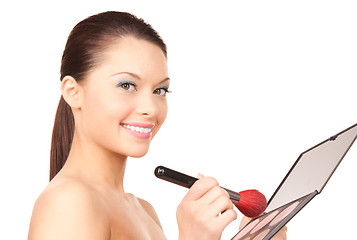 Image showing lovely woman with palette and brush