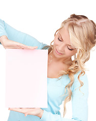 Image showing happy woman with blank board