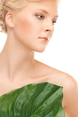 Image showing woman with green leaf