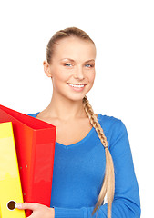 Image showing young attractive businesswoman with folders