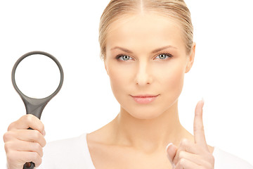 Image showing woman with magnifying glass