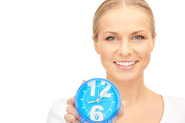 Image showing woman holding alarm clock