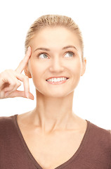 Image showing pensive businesswoman over white