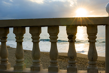 Image showing sunset over the rail with flare