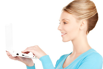 Image showing happy woman with laptop computer