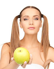 Image showing young beautiful woman with green apple