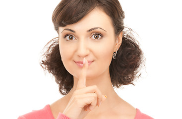 Image showing finger on lips 