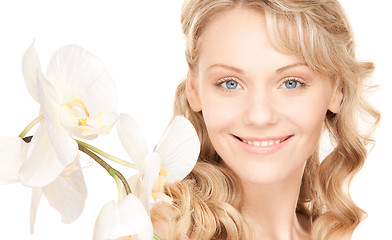 Image showing beautiful woman with white flower