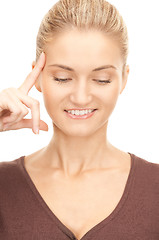 Image showing pensive businesswoman over white