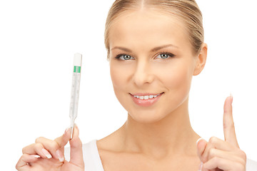 Image showing attractive female doctor with thermometer