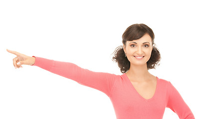 Image showing attractive businesswoman pointing her finger