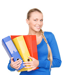 Image showing young attractive businesswoman with folders