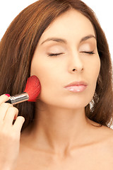 Image showing lovely woman with brush