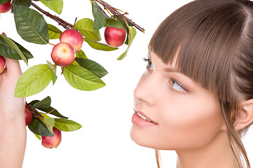 Image showing lovely woman with apple twig