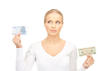 Image showing woman with euro and dollar money notes