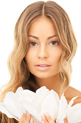 Image showing beautiful woman with white flower