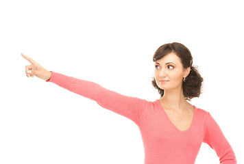 Image showing attractive businesswoman pointing her finger