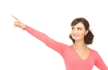 Image showing attractive businesswoman pointing her finger