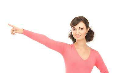 Image showing attractive businesswoman pointing her finger