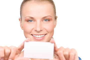 Image showing happy woman with business card