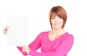 Image showing happy woman with blank board 