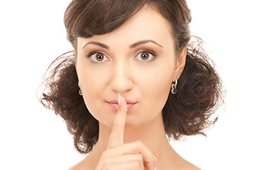 Image showing finger on lips 