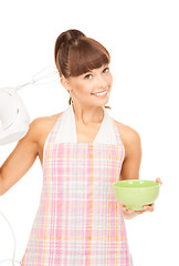 Image showing housewife with mixer