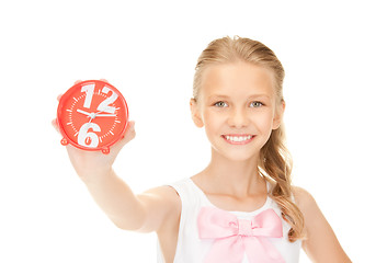 Image showing girl holding alarm clock