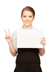 Image showing happy teenage girl with blank board