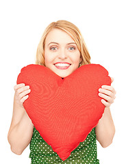 Image showing woman with red heart-shaped pillow