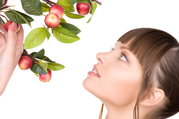 Image showing lovely woman with apple twig