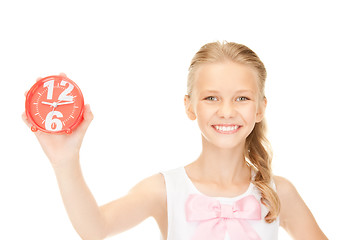 Image showing girl holding alarm clock
