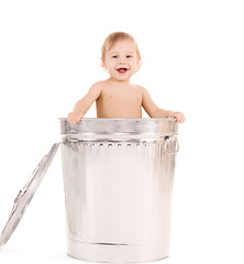 Image showing baby in trash can