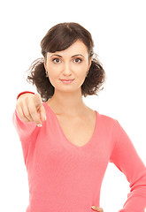 Image showing attractive businesswoman pointing her finger