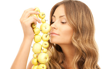 Image showing lovely woman with green apples
