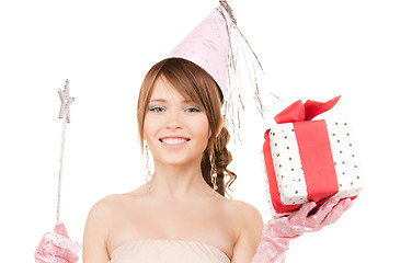 Image showing teenage party girl with magic wand and gift box