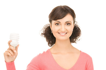 Image showing woman holding energy saving bulb